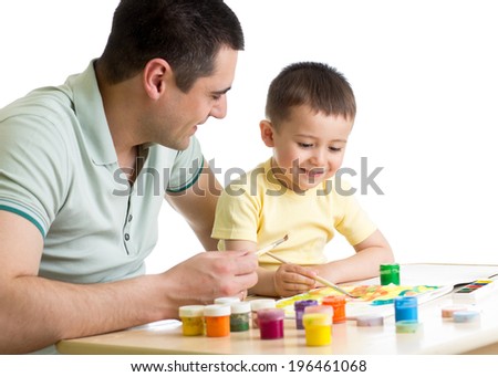 kid boy and dad paint together isolated on white