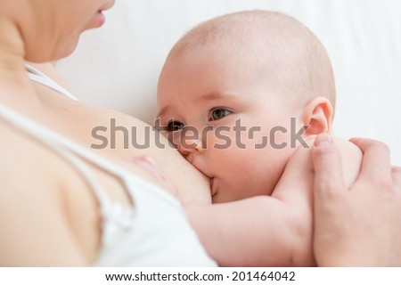mother breastfeeding her baby mother breastfeeding her baby