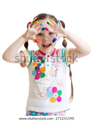 smiling kid girl looking through painted hands isolated