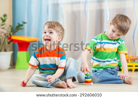 funny children play with toys indoor