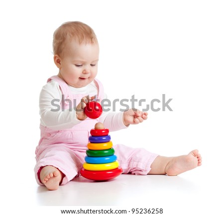 stock-photo-child-playing-with-color-pyramid-toy-95236258.jpg
