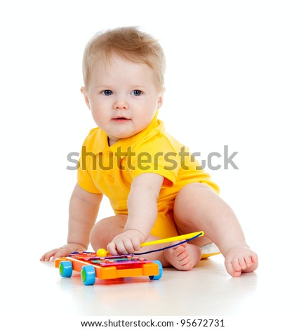 funny boy with musical toys funny boy with musical toys