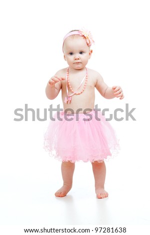 First steps of baby girl isolated on white background