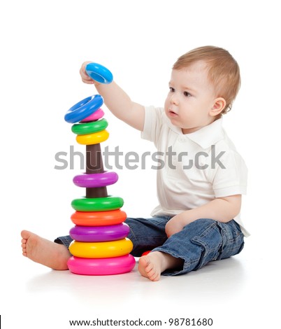 Child playing with educational cup toys Isolated on white background Child playing with educational cup toys Isolated on white background