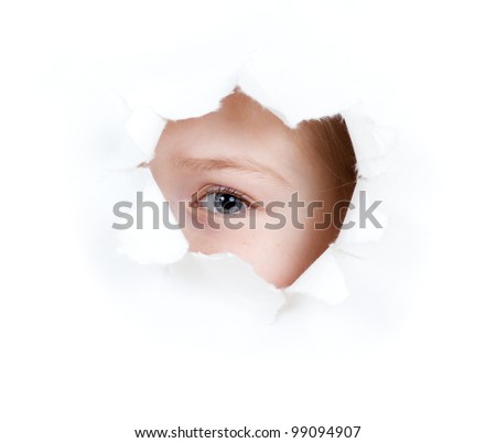 girl child eye in torn paper hole isolated