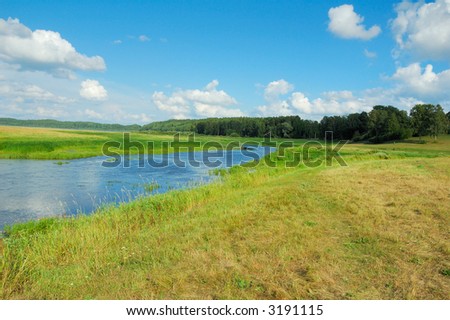 A blue river under the blue sky and lovely landscape