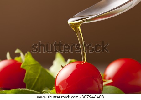 Olive oil is poured over it