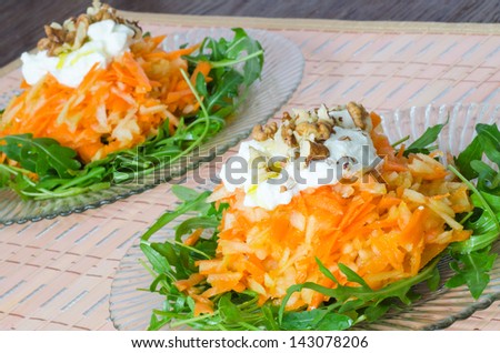 Carrot and apple salad with yogurt and walnuts