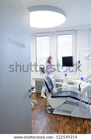 view in a room of Dentistry with Assistent on the background.