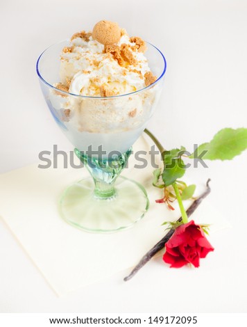 Ice cream with amaretto ice and vanilla with a rose a vanilla bean
