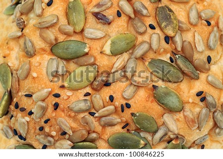 Bread with mixed seeds (pumpkin, sunflower, sesame) on a white background