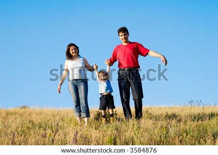 Running family. Father, mother and son