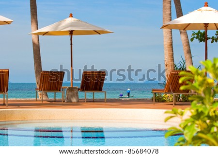 pool chair beside the seaview
