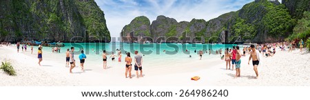 PHI PHI ISLAND,THAILAND-November 25, 2014: Tourists on the wonderful Maya beach of Phi Phi Leh island Thailand on 25 November, 2014.