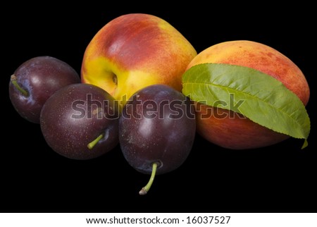 Plums And peaches On Black