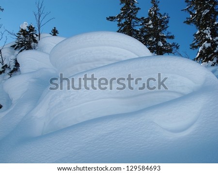 Snow shaped by wind