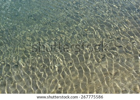 Water surface of a clean mountain lake