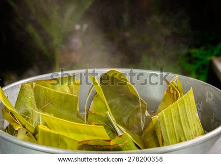 Streamed curry fish in banana leaf