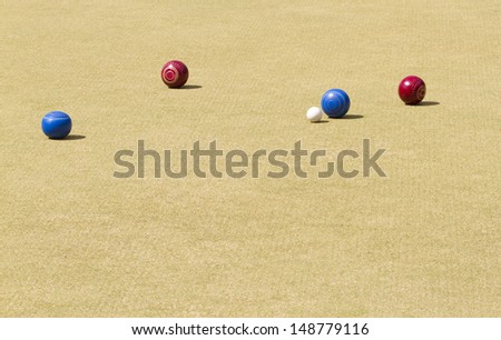 Bowls or lawn bowls is a sport which played on outdoor lawn which is natural grass or artificial turf.  The objective of the game is to roll balls which is to stop close to a small ball jack or kitty.