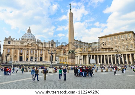 VATICAN CITY, VATICAN - MARCH 23: Tourists at Saint Peter\'s Square on March 23, 2012 in Vatican City, Vatican. Saint Peter\'s Square is among most popular pilgrimage sites for Roman Catholics.