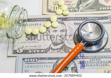 Medical still life with stethoscope, money, Isolated.