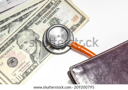 Medical still life with stethoscope, money, Isolated.