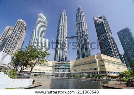 KUALA LUMPUR, MALAYSIA -MAY 11: Petronas Twin Towers at day on May 11, 2014 in Kuala Lumpur. Petronas Twin Towers were the tallest buildings (452 m) in the world from 1998 to 2004