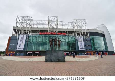 MANCHESTER, ENGLAND - September 6, 2014: Old Trafford stadium is home to Manchester United one of the wealthiest and most widely supported football teams in the world.