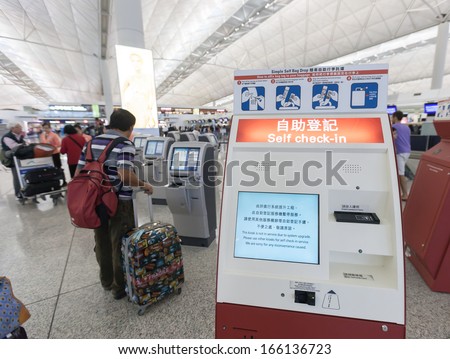 HONG KONG, CHINA - NOVEMBER 11:self check-in booth in the airport on November 11, 2013 in Hong Kong, China. The Hong Kong airport handles more than 70 million passengers per year.