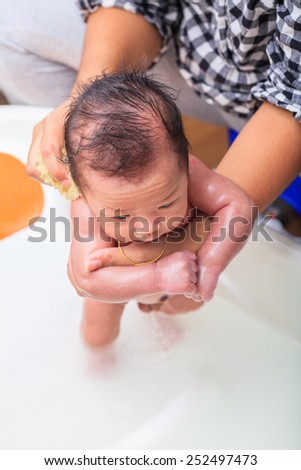take a bath infant,asian baby