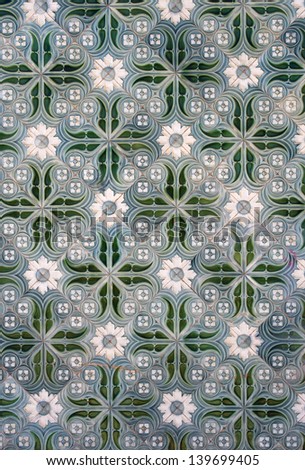 Close-up image of traditional green and white portuguese tiles