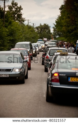SOPRON, HUNGARY - JUN 30: The main road is full of cars and people to the Volt Festival on Jun 30, 2011 in Sopron, Hungary.