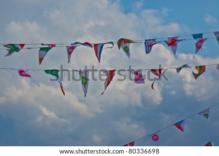 SOPRON, HUNGARY - JUL 1: Flags of EU countries and the Festival with nice clouds and blues sky on the Volt Festival, on Jul 1, 2011 in Sopron, Hungary.