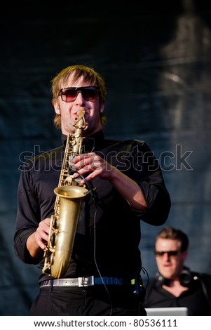 SOPRON, HUNGARY - JUL 2: Max tha Sax play on Sax (L) and Parov Stelar (R) from the Parov Stelar band  on the Main stage on the Volt Festival, on Jul 2, 2011 in Sopron, Hungary.