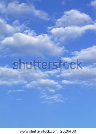 Blue sky with white clouds - vertical image