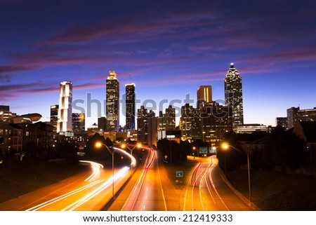 The best Atlanta Downtown overlook at dusk with traffic flow and blue sky red cloud/Atlanta downtown at dusk