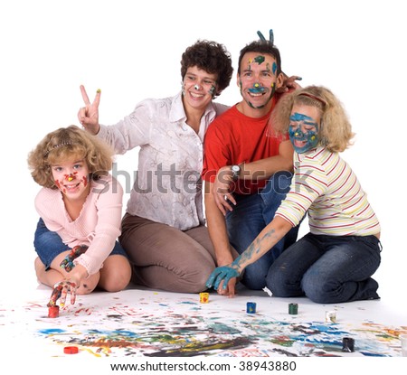 The painted family (mother, father and two girls-twins)