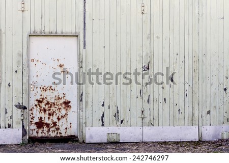 old shelter with rotten door. full frame image