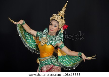 Portrait of Thai young lady in an ancient Thailand dance wea with isolated  background.