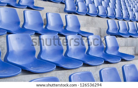 Blue chair. On the miraculous. To watch a sporting event.