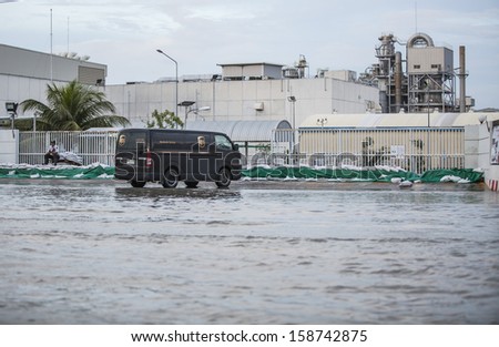 CHONBURI THAILAND - OCT 17 : Water flooding attack to Amata Nakorn Industrial Estate on Oct 17,2013 in Chonburi Thailand
