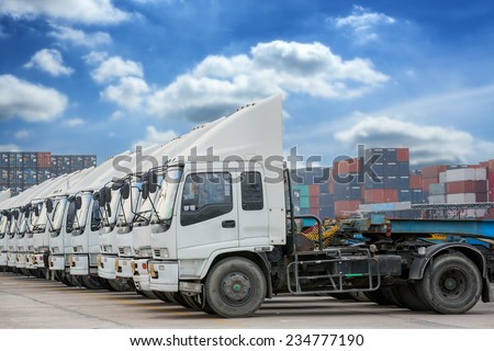Raw of Truck in container depot with blue sky and logistic background
