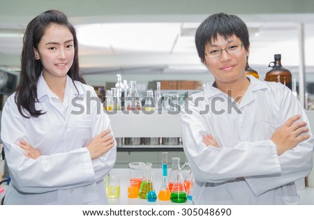 Technicians team operating chemical test in laboratory
