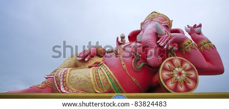 Pink indian god in relaxing on blue sky and white cloud,Thailand.