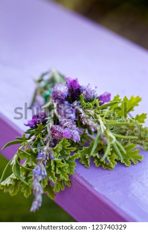 Aromatic herbs bunch on wooden table