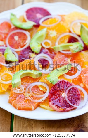 Salad with Citrus Fruits, Avocado and Onion. Also available in horizontal format.