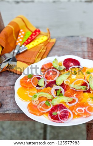 Salad with Citrus Fruits, Avocado and Onion. Also available in horizontal format.