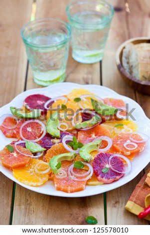 Salad with Citrus Fruits, Avocado and Onion. Ready-to-eat. Also available in horizontal format.