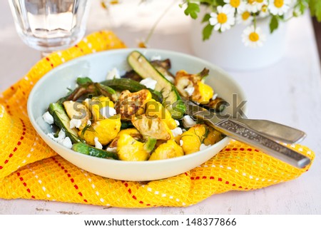 Fried Zucchini and Patty Pan Squash with white cheese ready to eat. Also available in vertical format.