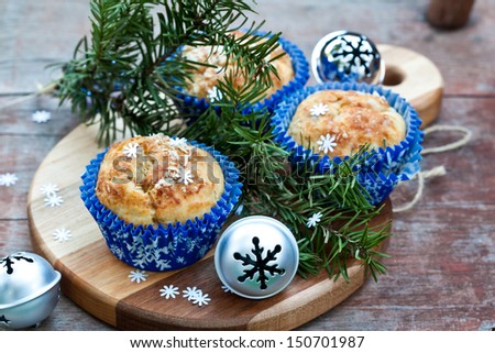 Muffins with  Blue Snowflakes Cup with Christmas Tree and Bells. Also available in vertical format.